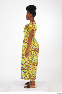 Dina Moses dressed standing whole body yellow long decora apparel…